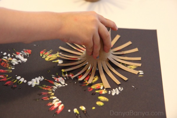 Fireworks-painting-using-DIY-toilet-paper-roll-stampers